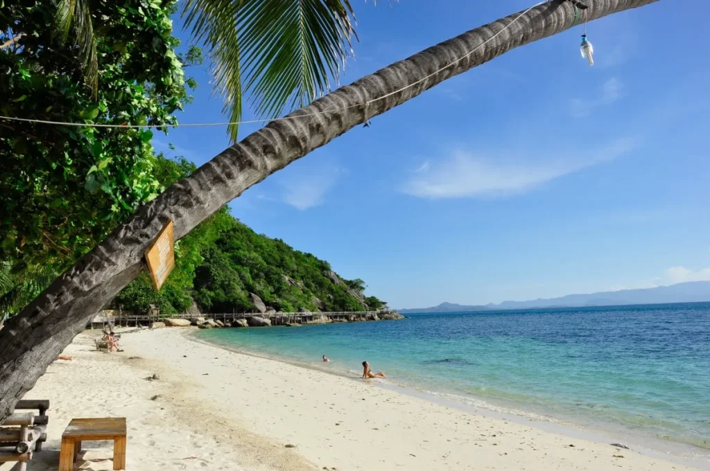 A photo of an amazing beach with a big sun at Koh Samui in Thailand.